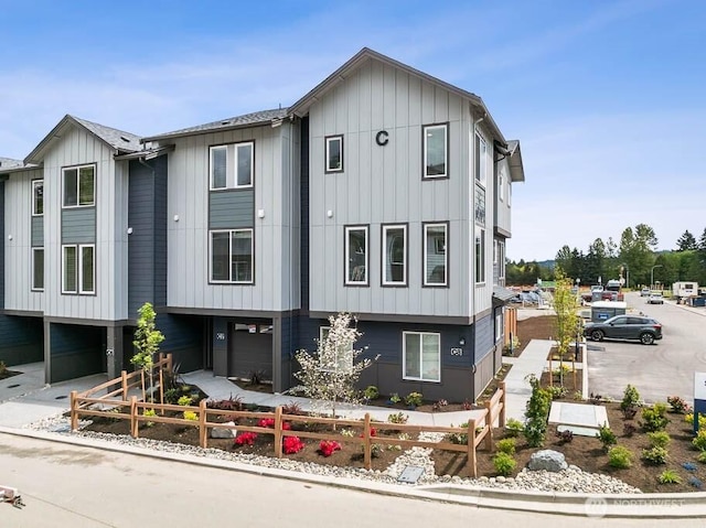 14707 87th Ave SE Unit W1, Snohomish, WA 98296 - view of front facade with an attached garage and a fenced front yard