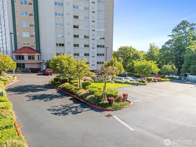 3201 Pacific Ave Unit 602, Tacoma, WA 98418 - view of property featuring uncovered parking