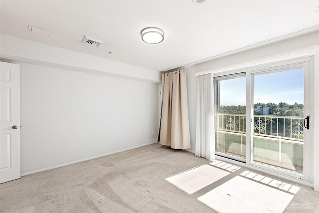 3201 Pacific Ave Unit 602, Tacoma, WA 98418 - empty room featuring light carpet and baseboards