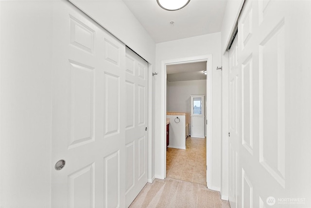 3201 Pacific Ave Unit 602, Tacoma, WA 98418 - hallway with light colored carpet and light tile patterned floors