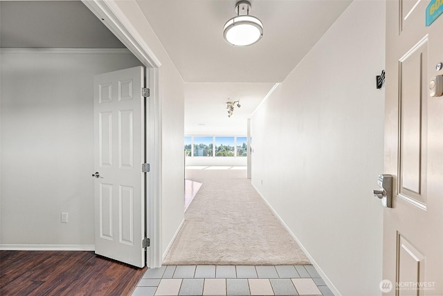 3201 Pacific Ave Unit 602, Tacoma, WA 98418 - hallway featuring carpet floors and baseboards