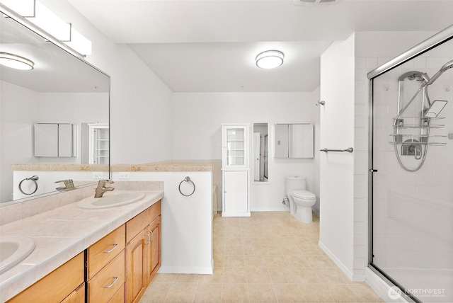 3201 Pacific Ave Unit 602, Tacoma, WA 98418 - bathroom with a shower stall, double vanity, and tile patterned flooring