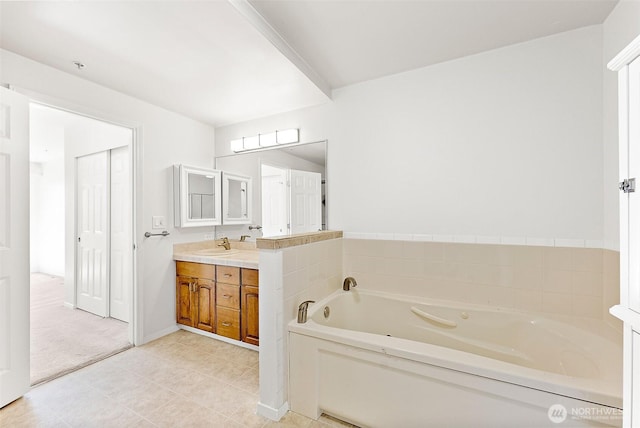 3201 Pacific Ave Unit 602, Tacoma, WA 98418 - full bathroom featuring vanity, a bath, and tile patterned flooring