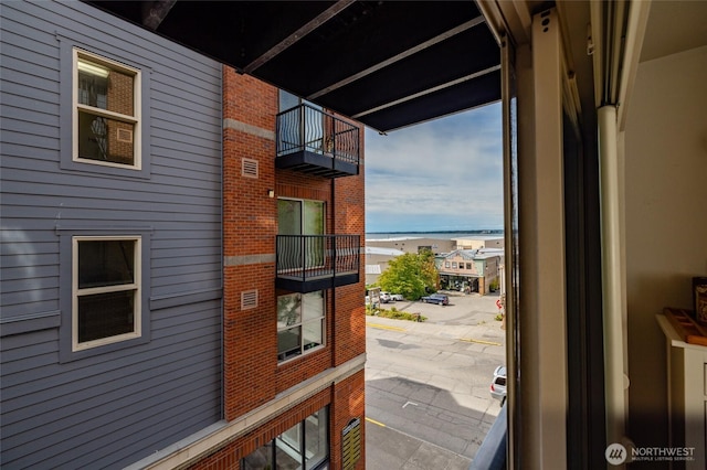 960 Harris Ave Unit 305, Bellingham, WA 98225 - doorway featuring a water view and wooden walls