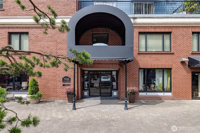 960 Harris Ave Unit 305, Bellingham, WA 98225 - property entrance featuring brick siding and a balcony