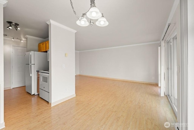15146 65th Ave S Unit 518, Tukwila, WA 98188 - unfurnished living room featuring light wood-style flooring, ornamental molding, and a chandelier