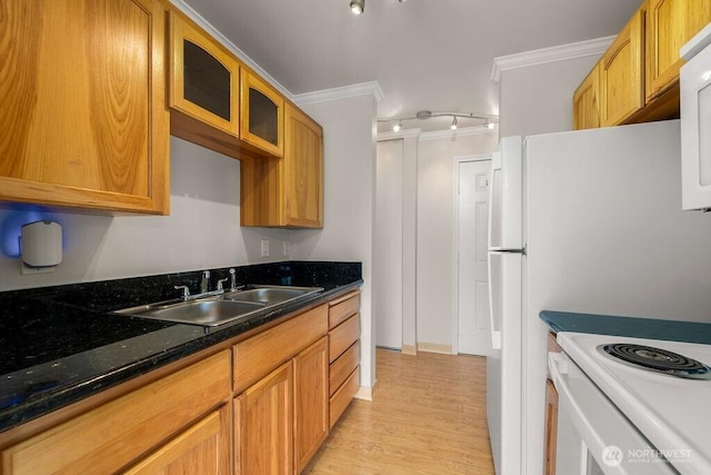 15146 65th Ave S Unit 518, Tukwila, WA 98188 - kitchen with crown molding, glass insert cabinets, and light wood-style flooring