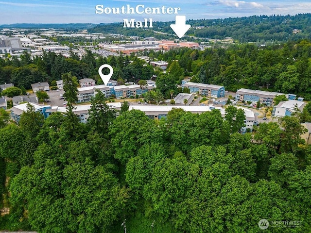 15146 65th Ave S Unit 518, Tukwila, WA 98188 - aerial overview of property's location featuring a forest