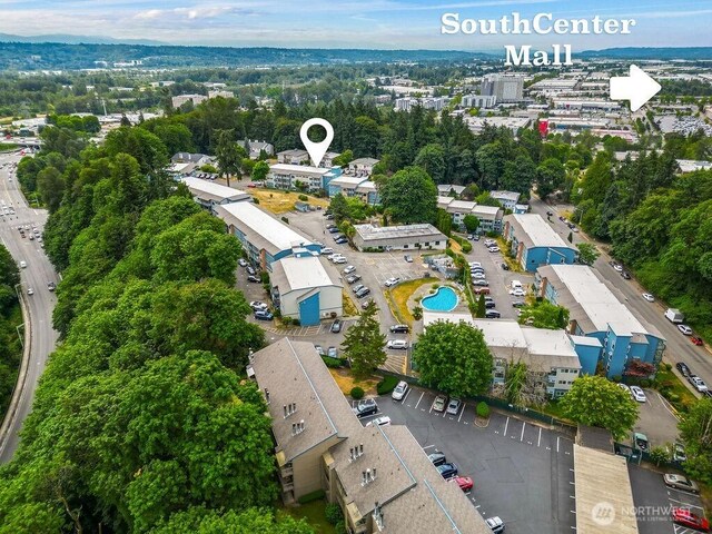 15146 65th Ave S Unit 518, Tukwila, WA 98188 - drone / aerial view of a tree filled landscape