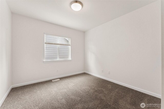 14756 88th Way SE Unit 10, Yelm, WA 98597 - carpeted spare room with baseboards