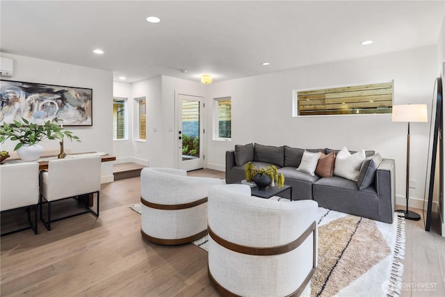 2616 E Roy St, Seattle, WA 98112 - living room with light wood-type flooring and recessed lighting