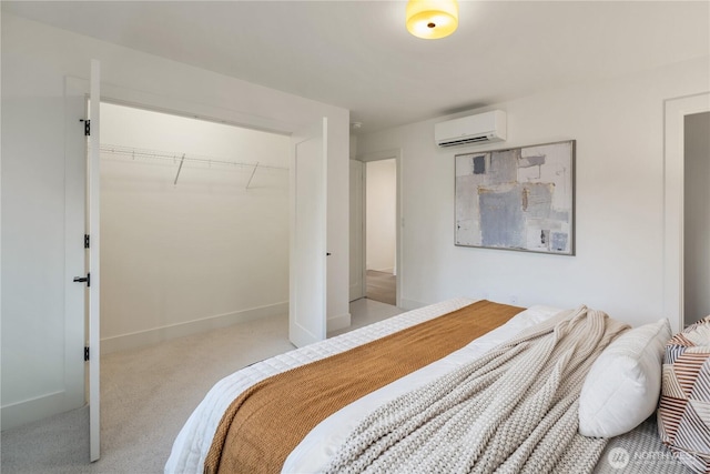 2616 E Roy St, Seattle, WA 98112 - bedroom with a wall unit AC, carpet floors, and a closet