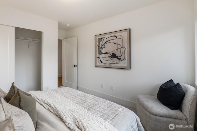 2616 E Roy St, Seattle, WA 98112 - carpeted bedroom featuring a closet and baseboards
