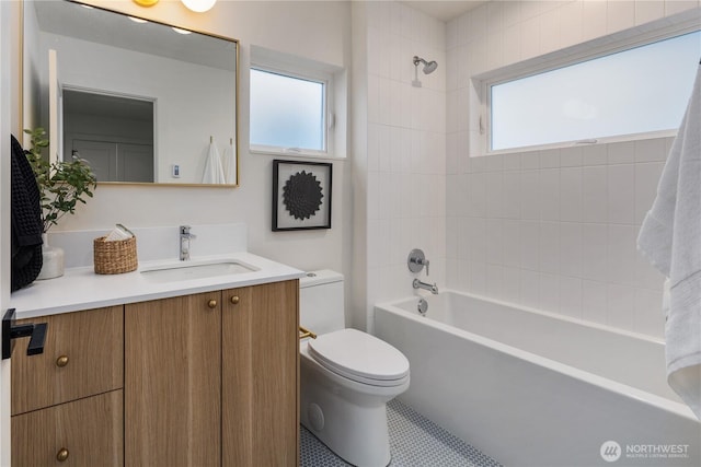 2616 E Roy St, Seattle, WA 98112 - bathroom with healthy amount of natural light, vanity, and bathtub / shower combination