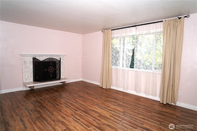 4011 147th Pl SE, Bellevue, WA 98006 - unfurnished living room with wood finished floors and a high end fireplace