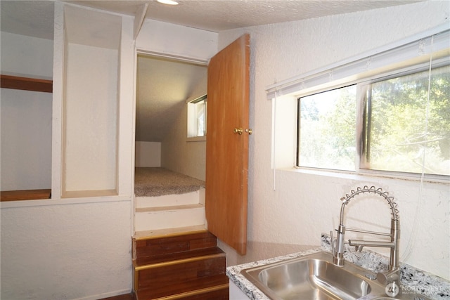 4011 147th Pl SE, Bellevue, WA 98006 - kitchen featuring a textured wall and a textured ceiling