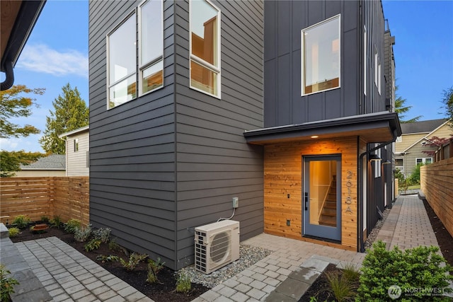 2618A E Roy St, Seattle, WA 98112 - back of house with board and batten siding and a patio area