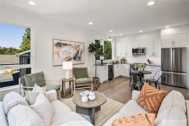 2618A E Roy St, Seattle, WA 98112 - living area featuring recessed lighting and dark wood-style floors