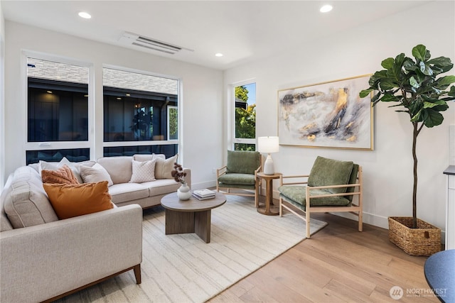 2618A E Roy St, Seattle, WA 98112 - living area featuring wood finished floors and recessed lighting