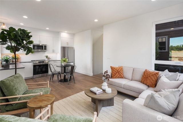 2618A E Roy St, Seattle, WA 98112 - living area featuring recessed lighting and wood finished floors