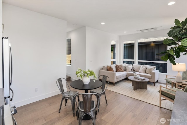 2618A E Roy St, Seattle, WA 98112 - dining space featuring light wood-style floors and recessed lighting