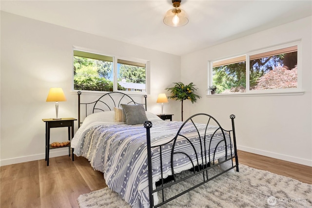 10507 NE 193rd St, Bothell, WA 98011 - bedroom with baseboards and wood finished floors