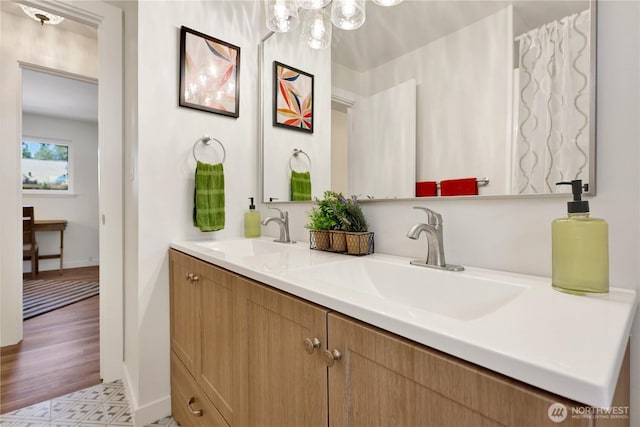 10507 NE 193rd St, Bothell, WA 98011 - bathroom with double vanity and baseboards