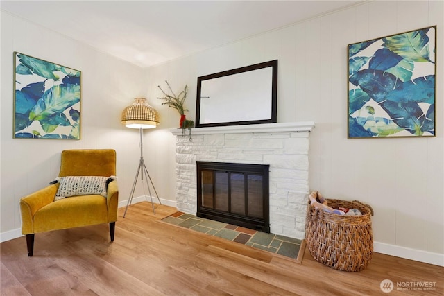 10507 NE 193rd St, Bothell, WA 98011 - sitting room with wood finished floors and a fireplace