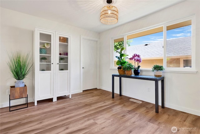 10507 NE 193rd St, Bothell, WA 98011 - foyer with light wood-style flooring and baseboards