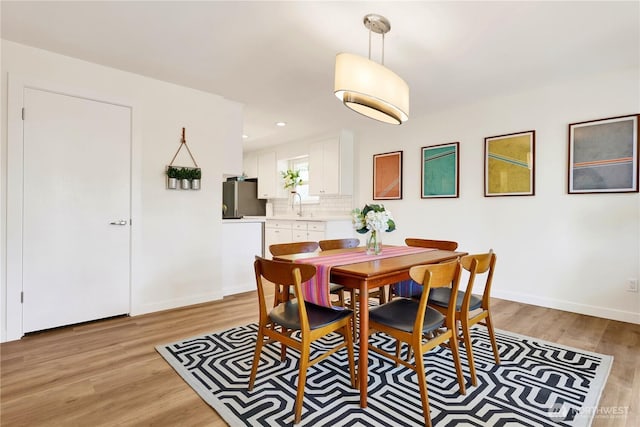 10507 NE 193rd St, Bothell, WA 98011 - dining room featuring light wood-type flooring and recessed lighting