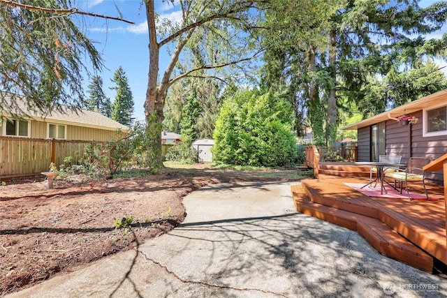 10507 NE 193rd St, Bothell, WA 98011 - view of patio with a deck and outdoor dining space
