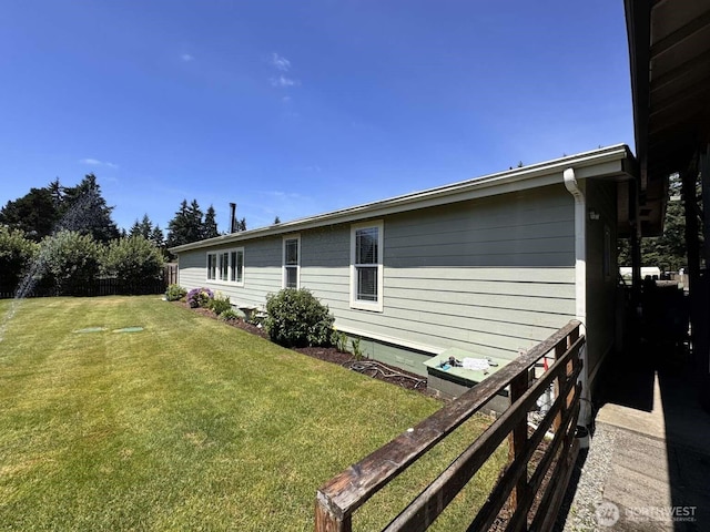 8839 Daffodil Ln SE, Olympia, WA 98513 - view of home's exterior with a lawn