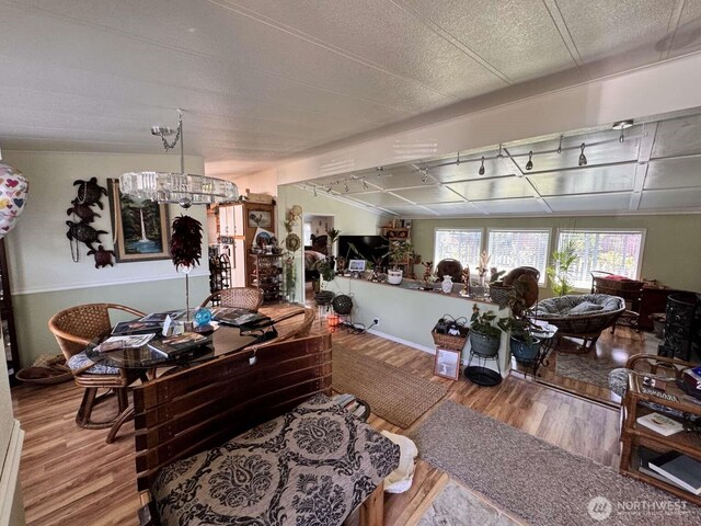 8839 Daffodil Ln SE, Olympia, WA 98513 - living area featuring wood finished floors