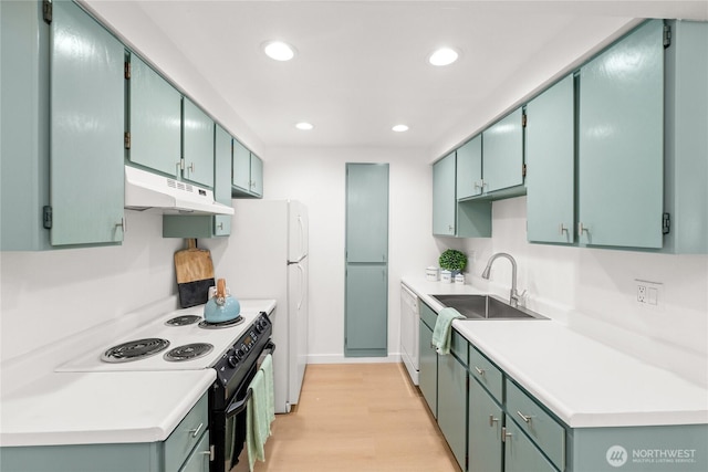 12504 NE 142nd Ln Unit C102, Kirkland, WA 98034 - kitchen featuring under cabinet range hood, electric range, light wood-style flooring, recessed lighting, and light countertops