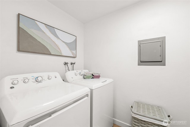 12504 NE 142nd Ln Unit C102, Kirkland, WA 98034 - washroom featuring electric panel and washing machine and dryer