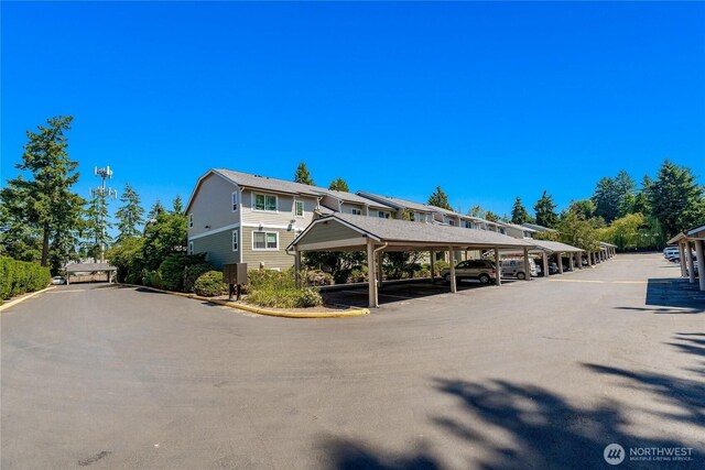 12504 NE 142nd Ln Unit C102, Kirkland, WA 98034 - exterior space with covered parking