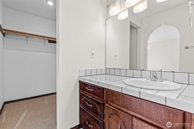 2621 Mountain View Ave W Unit 5B, Tacoma, WA 98466 - bathroom with vanity and a spacious closet