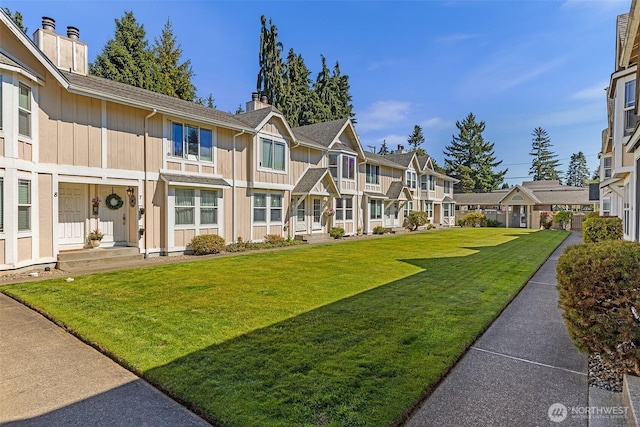 2621 Mountain View Ave W Unit 5B, Tacoma, WA 98466 - view of community featuring a residential view and a yard