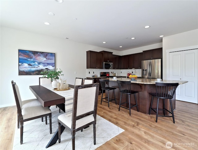 16271 SE 181st St, Renton, WA 98058 - dining space featuring light wood-style flooring and recessed lighting