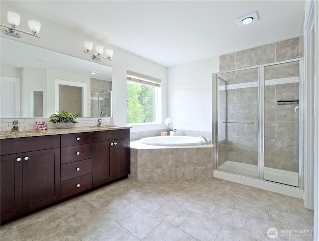 16271 SE 181st St, Renton, WA 98058 - bathroom with a bath, a shower stall, double vanity, and tile patterned floors