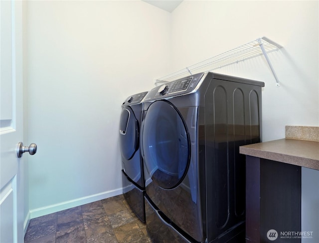16271 SE 181st St, Renton, WA 98058 - laundry area featuring washer and dryer and stone finish flooring