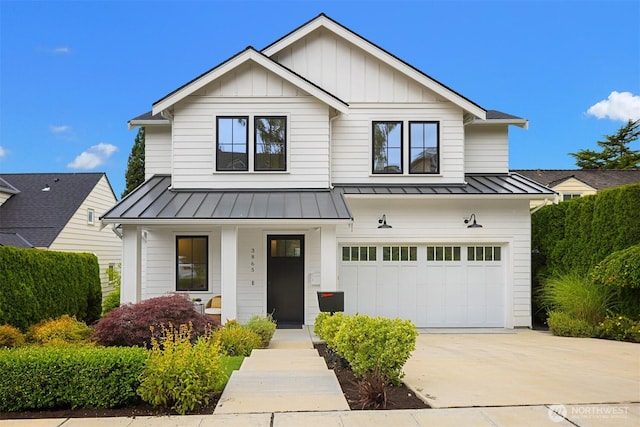 3865 46th Ave NE, Seattle, WA 98105 - modern farmhouse featuring a standing seam roof, a garage, covered porch, concrete driveway, and board and batten siding