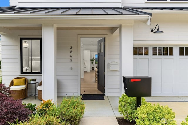 3865 46th Ave NE, Seattle, WA 98105 - entrance to property with a standing seam roof, a porch, and a metal roof