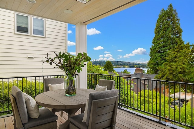 3865 46th Ave NE, Seattle, WA 98105 - deck with a water view and outdoor dining space