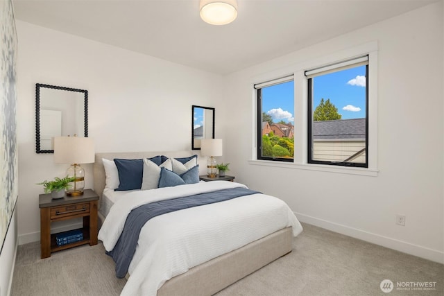 3865 46th Ave NE, Seattle, WA 98105 - bedroom featuring baseboards and carpet floors