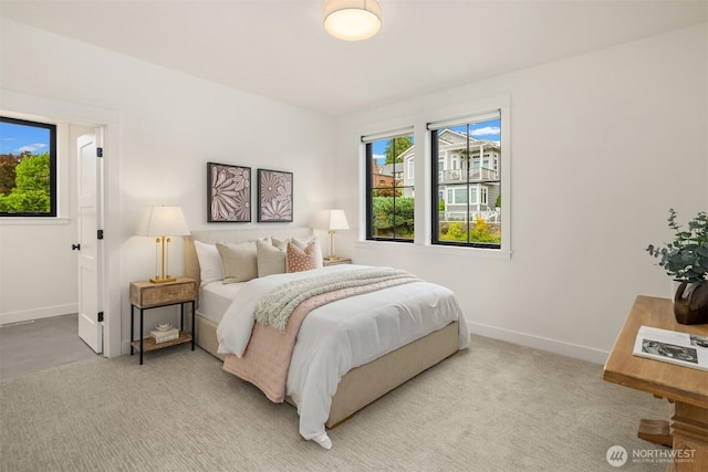 3865 46th Ave NE, Seattle, WA 98105 - bedroom with multiple windows and light carpet