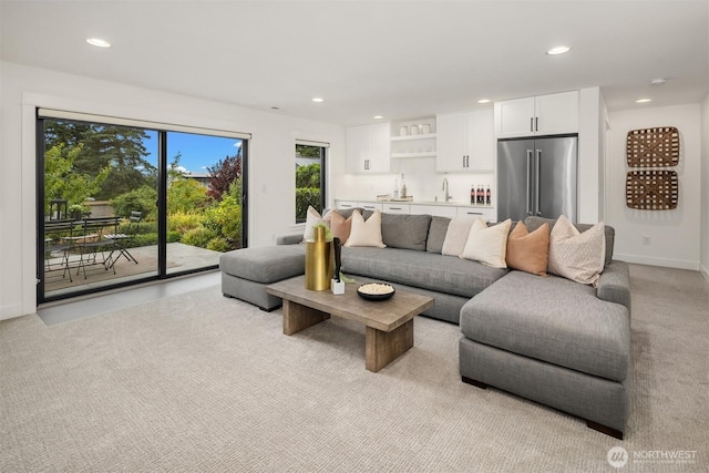3865 46th Ave NE, Seattle, WA 98105 - living area featuring recessed lighting, light carpet, and bar