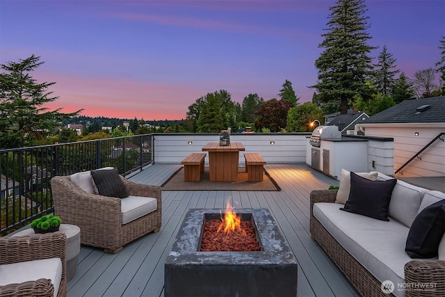 3865 46th Ave NE, Seattle, WA 98105 - deck with an outdoor kitchen and an outdoor living space with a fire pit
