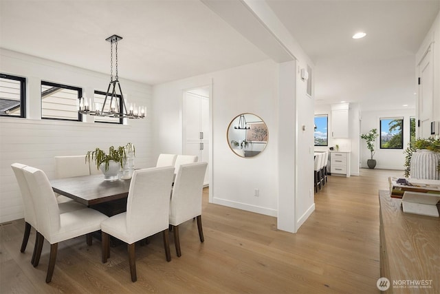 3865 46th Ave NE, Seattle, WA 98105 - dining area featuring light wood-style floors, a chandelier, and recessed lighting