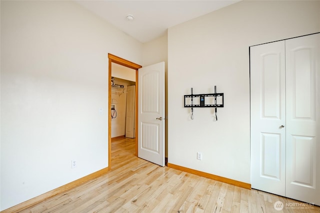4824 Willow Dr, Blaine, WA 98230 - unfurnished bedroom with light wood-style floors and baseboards